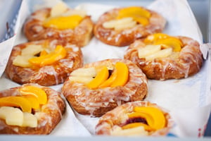 The bakery sells sweet danish pastry with fruit